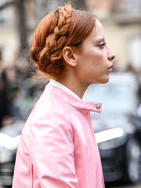 Marie Gaguech wearing a crown braid and a pink jacket
